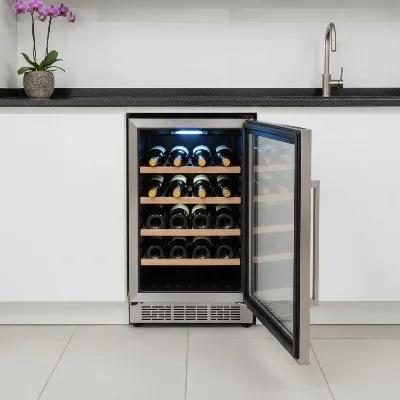 Colzer Classic 15 Inch Wine Cooler with bottles, showing stainless steel and blue interior light.